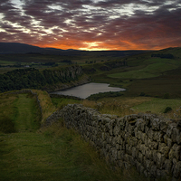 Buy canvas prints of  Sundown over the Roman Wall at Sewingshields Crag by K7 Photography