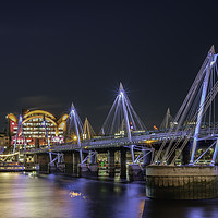 Buy canvas prints of Hungerford Foot Bridge and Charing Cross Station. by K7 Photography