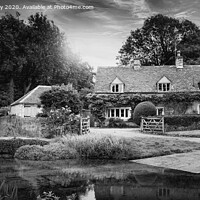 Buy canvas prints of Enchanting Thatched Cottage in Upper Slaughter by K7 Photography