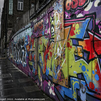Buy canvas prints of Graffiti Hoarding  by Nigel Bangert