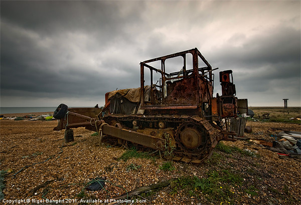 Bulldozer at Dungeness Picture Board by Nigel Bangert