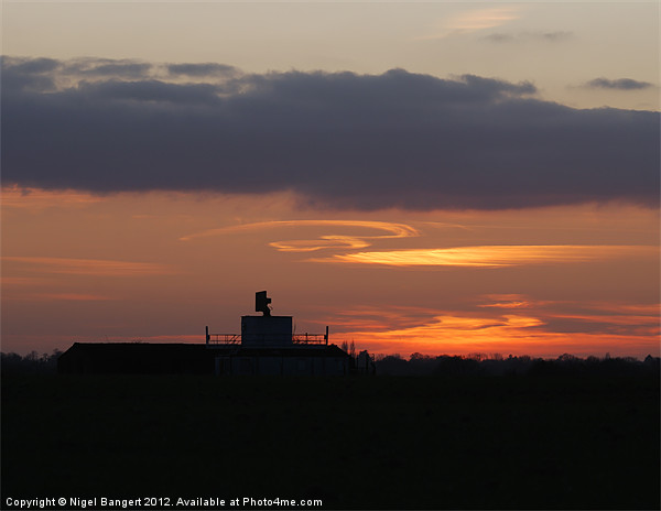 Sunset at Matching Airfield Picture Board by Nigel Bangert