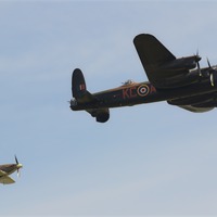 Buy canvas prints of BBMF Lancaster and Hurricane by Nigel Bangert