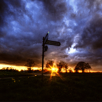 Buy canvas prints of Crossroads Sunset by Nigel Bangert