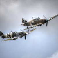 Buy canvas prints of  BBMF Spitfire and Hurricane by Nigel Bangert