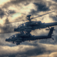 Buy canvas prints of  AH-64 Apaches by Nigel Bangert