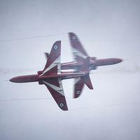 Buy canvas prints of  Red Arrows Close Pass by Nigel Bangert