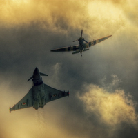 Buy canvas prints of  Eurofighter and Spitfire Flypast by Nigel Bangert
