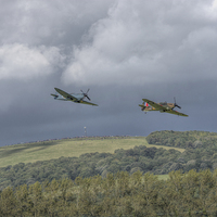 Buy canvas prints of  Hurricane and Spitfire Flypast  by Nigel Bangert