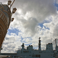Buy canvas prints of  HMS Victory Overlooking HMS Illustrious by Terri Waters