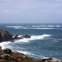 Buy canvas prints of Lands End And Longships Lighthouse  by Terri Waters