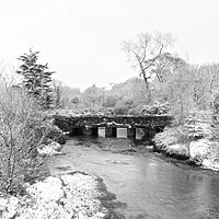 Buy canvas prints of Old Carnon Bridge in the Snow by Terri Waters