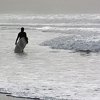 Buy canvas prints of Lone Surfer by Terri Waters