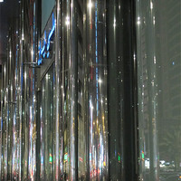 Buy canvas prints of Abu Dhabi street reflections by DEE- Diana Cosford