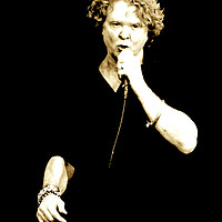 Buy canvas prints of Mick Hucknell Simply Red at Cartmel Racecourse by DEE- Diana Cosford