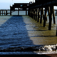 Buy canvas prints of Deal Pier legs & shingle shore, Kent by DEE- Diana Cosford