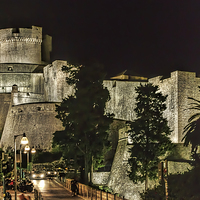 Buy canvas prints of  Dubrovnic Fortress and walls at night by Colin Metcalf