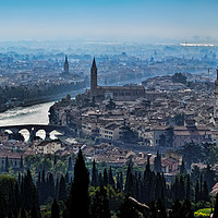 Buy canvas prints of First Light Illuminating Verona's Charm by Colin Metcalf