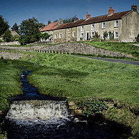 Buy canvas prints of Idyllic Hutton-le-Hole Village Charm by Colin Metcalf
