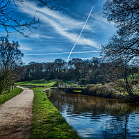 Buy canvas prints of Vapour trails over the canal. by Colin Metcalf