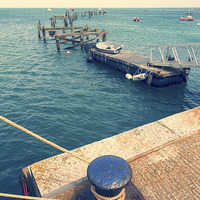 Buy canvas prints of  Old Swanage Pier In Vintage Tones by Linsey Williams