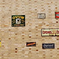 Buy canvas prints of  Ad wall by Andrew Poynton