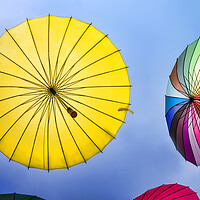 Buy canvas prints of Colourful Umbrellas by Valerie Paterson