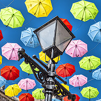 Buy canvas prints of Colourful Umbrellas by Valerie Paterson