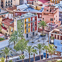 Buy canvas prints of Alicante Coloured Houses by Valerie Paterson