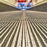 Buy canvas prints of Moving Stairs by Valerie Paterson