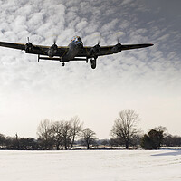 Buy canvas prints of Nearly home - Lancaster limping back in winter by Gary Eason