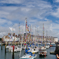 Buy canvas prints of Weymouth yachts with bunting by Gary Eason