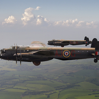 Buy canvas prints of Lancasters AJ-G and AJ-N carrying Upkeeps by Gary Eason