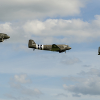 Buy canvas prints of D-Day C47 Skytrain trio by Gary Eason