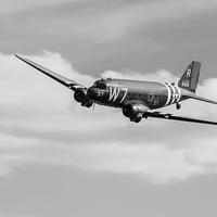Buy canvas prints of Douglas C-47 Skytrain Whiskey 7 by Gary Eason