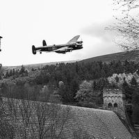 Buy canvas prints of Canadian Lancaster V-RA at the Derwent Dam black a by Gary Eason