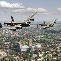Buy canvas prints of Two Lancasters over Lincoln Cathedral by Gary Eason