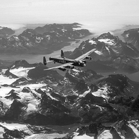 Buy canvas prints of Lancaster over Greenland black and white version by Gary Eason