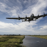 Buy canvas prints of 617 Squadron Dambusters Lancaster at low level by Gary Eason