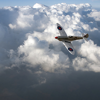 Buy canvas prints of Soaring silver Spitfire cloudscape by Gary Eason