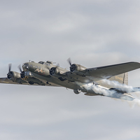 Buy canvas prints of Flying Fortress Sally B's smoke tribute by Gary Eason