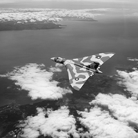 Buy canvas prints of Vulcan over South Wales black and white version by Gary Eason
