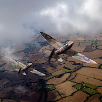 Buy canvas prints of Spitfires among low clouds by Gary Eason