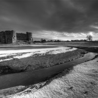 Buy canvas prints of Carew castle winter landscape by Creative Photography Wales