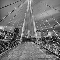 Buy canvas prints of The Embankment Pedestrian Bridge at Night, London by Creative Photography Wales