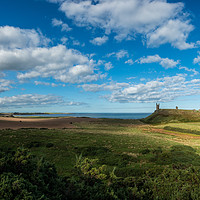 Buy canvas prints of Dunstanburgh Castle on the Northumberland Coast by Creative Photography Wales