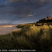Buy canvas prints of Bamburgh Castle on the Northumberland Coast by Creative Photography Wales