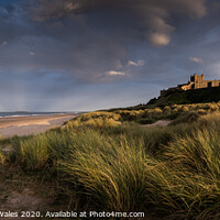 Buy canvas prints of Bamburgh Castle on the Northumberland Coast by Creative Photography Wales