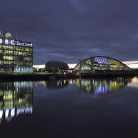 Buy canvas prints of Glasgow River Clyde - Pacific Quay at Sunset by Maria Gaellman