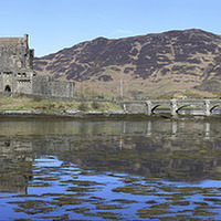 Buy canvas prints of Eilean Donan Castle - Panorama by Maria Gaellman